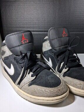 Nike Air Jordan 1 Mid Black Elephant Print Sneakers